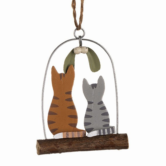 Kitties under mistletoe decoration