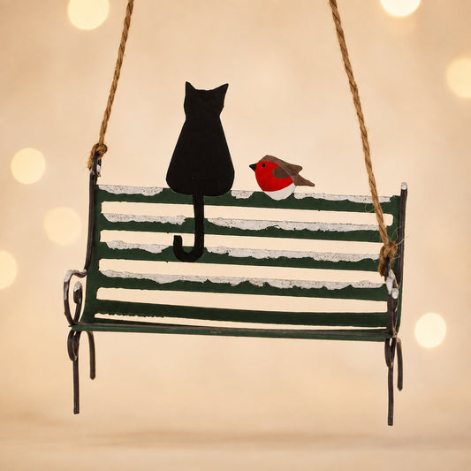 Black cat on bench decoration