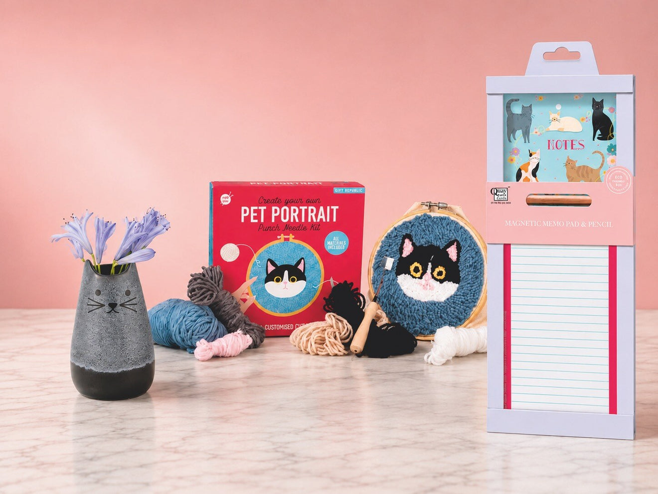 A group of Cats Protection gifts, including mugs and stationery